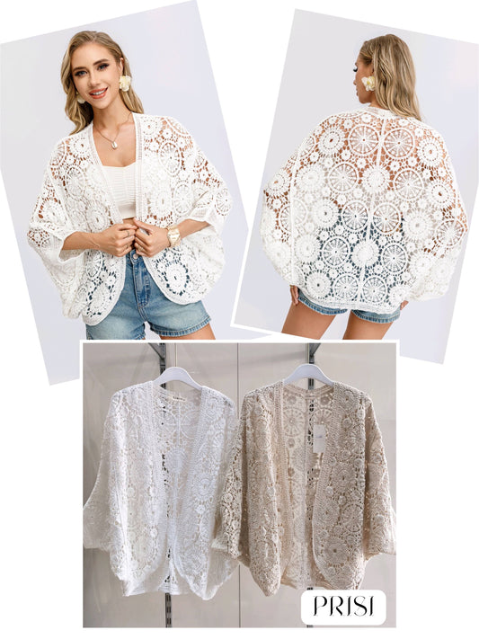 Елегантна плетена жилетка